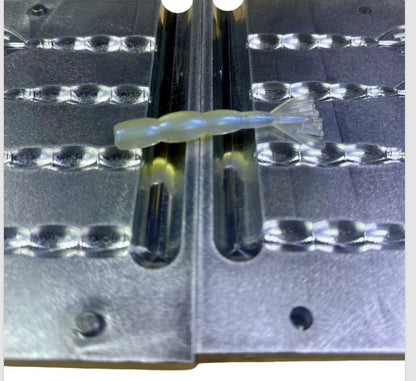This precision-machined aluminum mold is designed for serious lure makers who want consistent results and clean bait detail. Made in the USA from high-grade 6061 aluminum, this 3-cavity mold produces 3-inch shrimp tail soft plastics ideal for inshore saltwater applications.